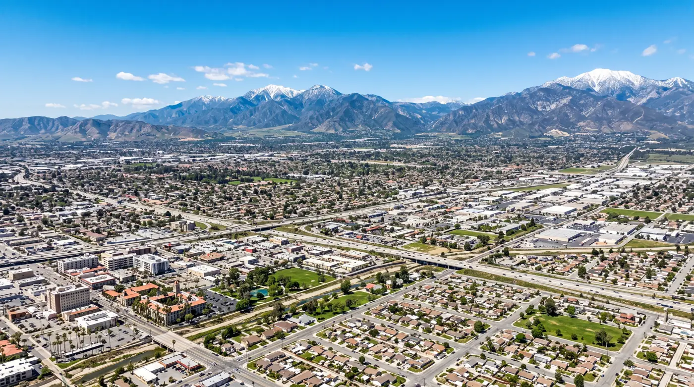 Inland Empire valley and mountains representing the Riverside and San Bernardino dental practice market